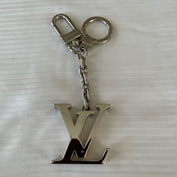 Louis Vuitton Accessories - Louis Vuitton. LV Initials bag charm or key chain. Great used condition.